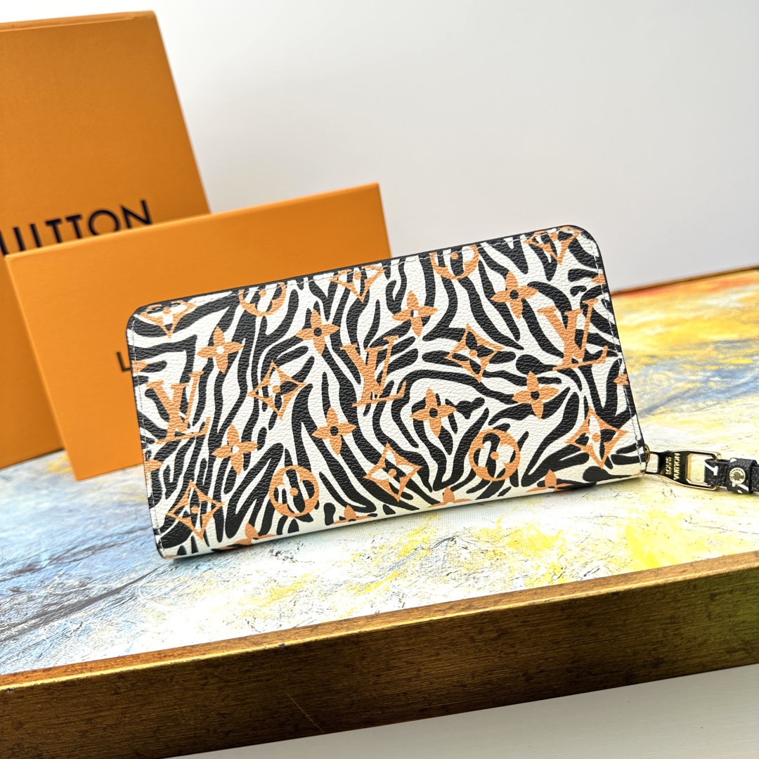 Zip around wallet with coin pocket detail.