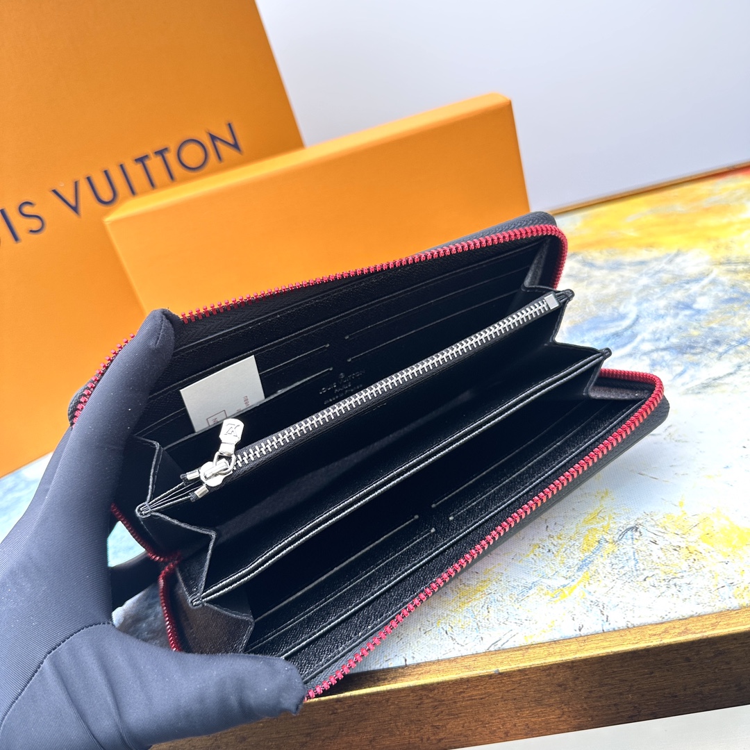 Close-up of card slots in a long leather wallet