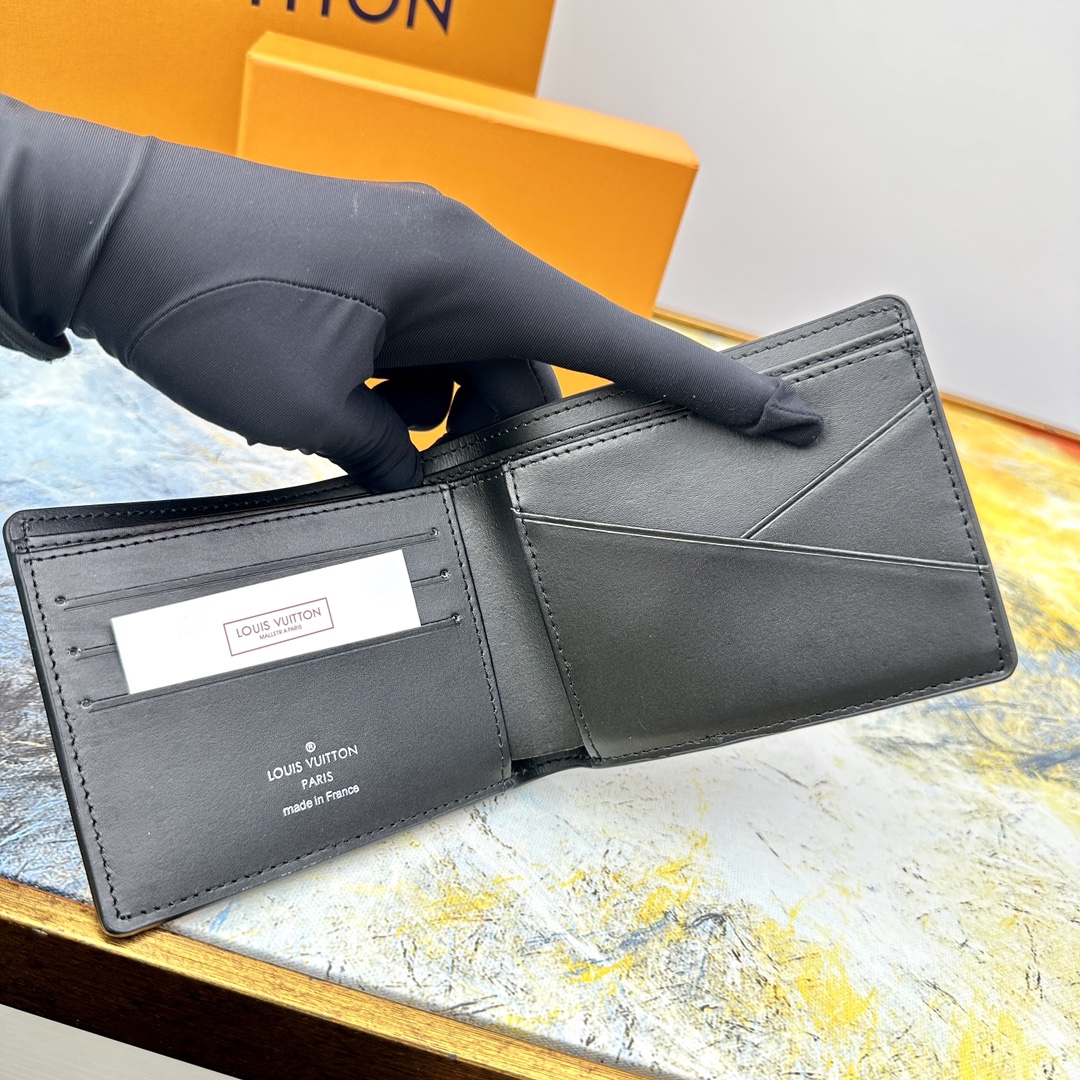 Genuine leather bifold wallet in hand