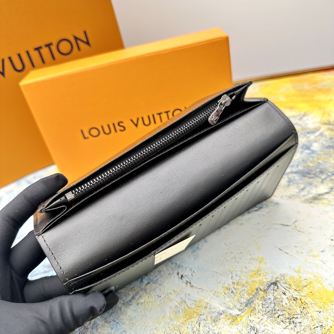 Leather bifold wallet showing leather aging over time