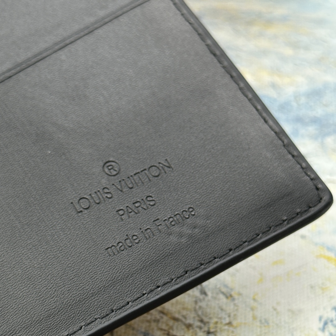 Leather bifold wallet with card in it