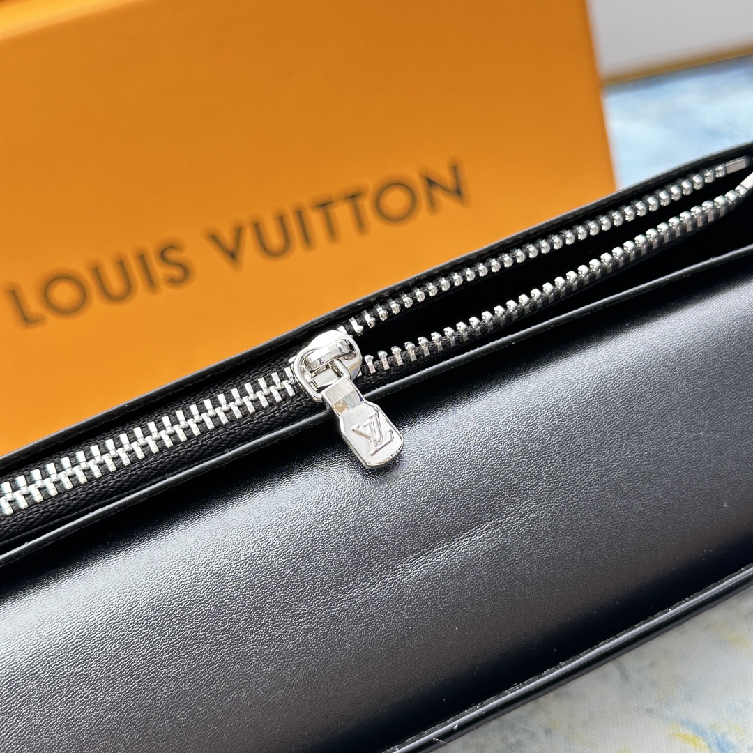 Leather bifold wallet showing leather aging over time