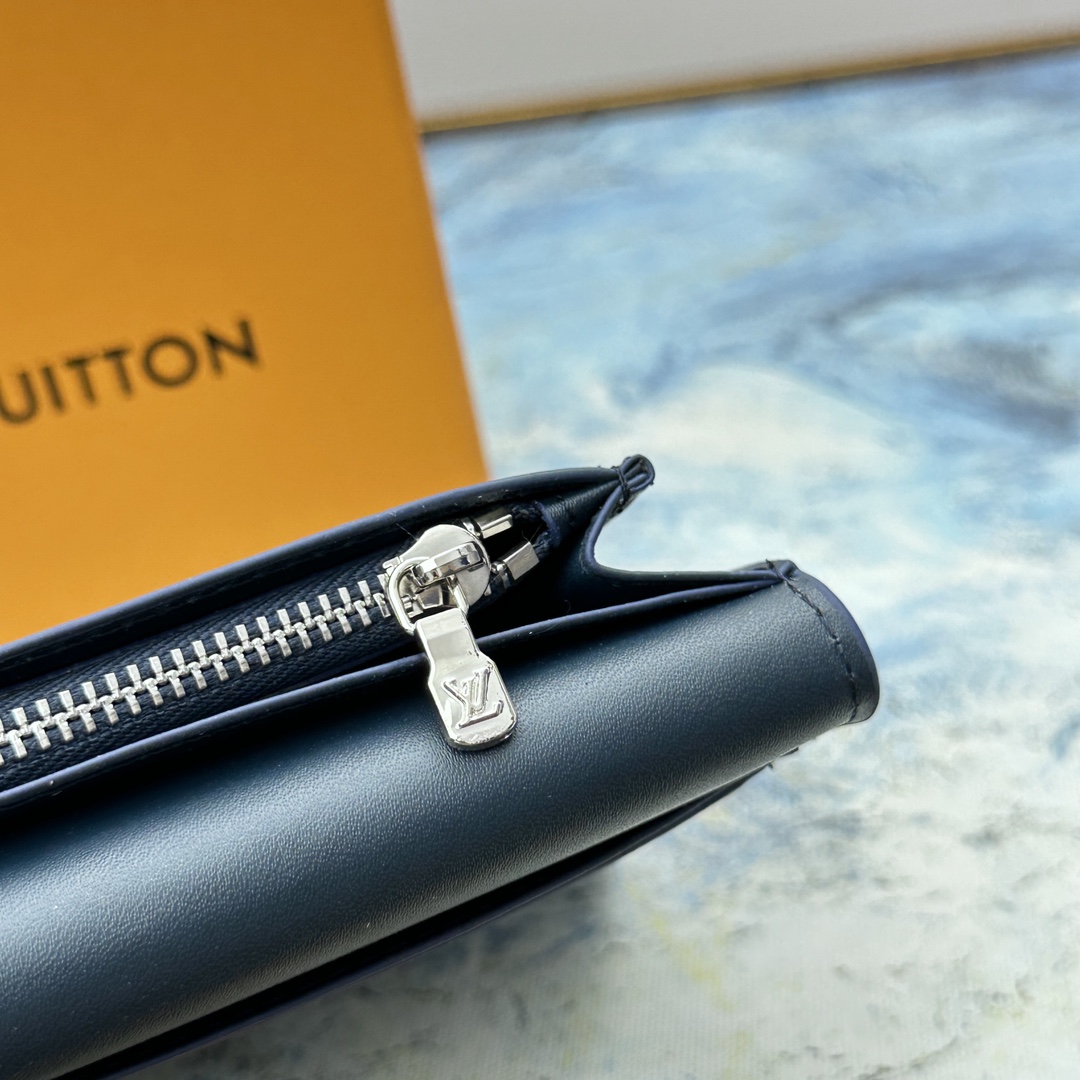 Leather bifold wallet with card in it