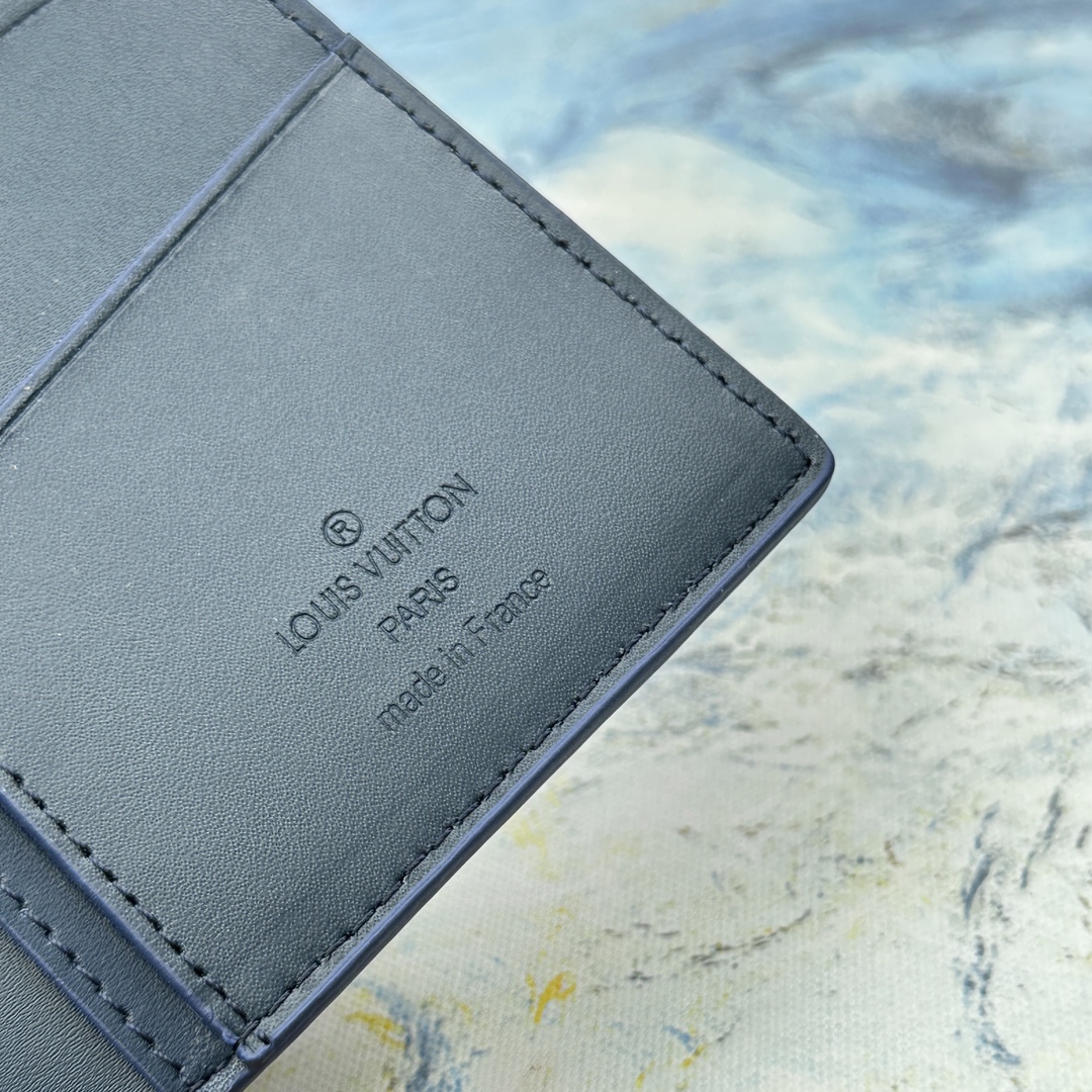 Leather bifold wallet showing leather aging over time