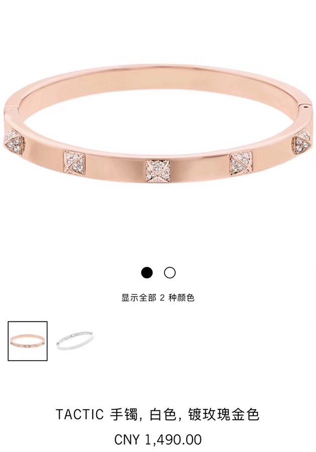 Title: Schwartz Pyramid Bracelet with Golden Rose VD and Crystal Imitation Summary: Elegant bracelet with sharp horn design, transparent crystal, and versatile styling options for glamorous looks.