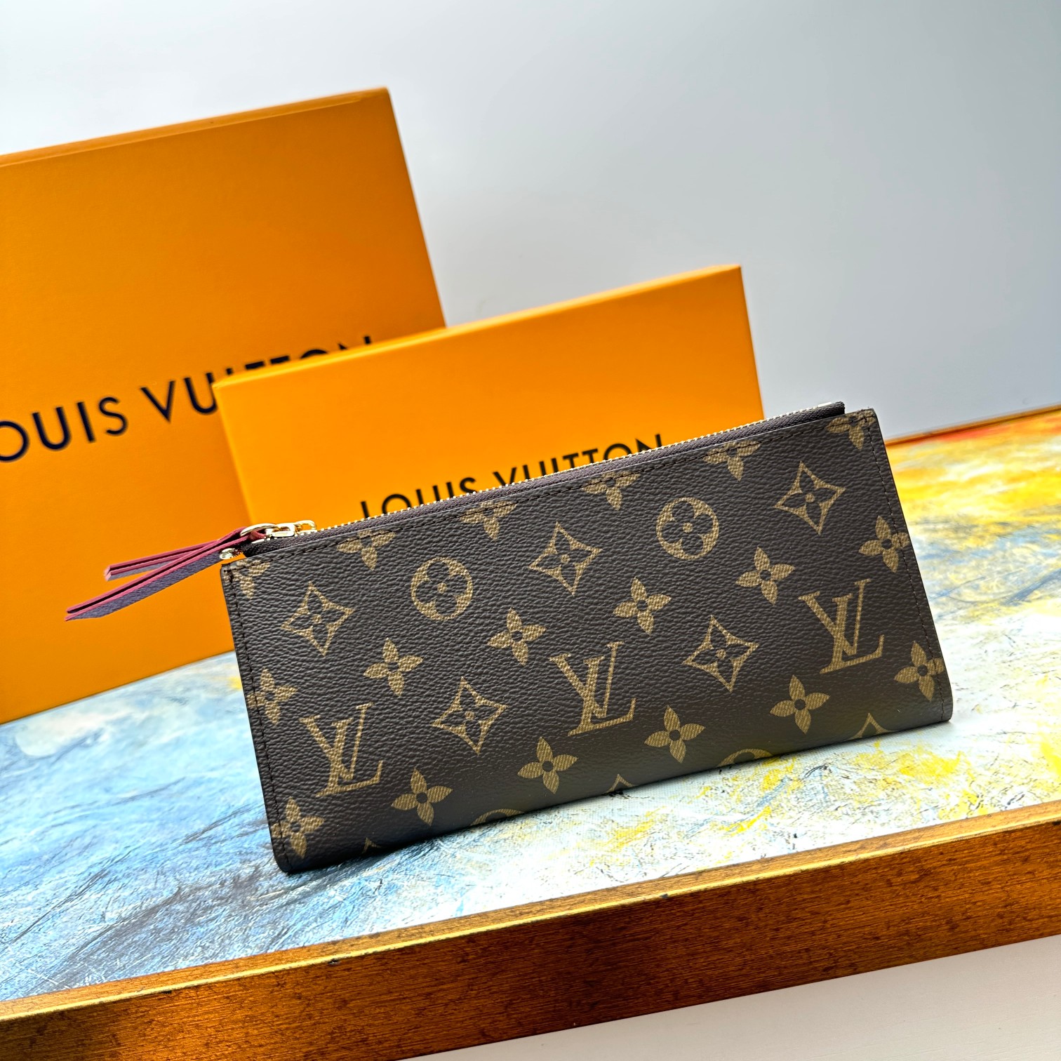 Combining Louis Vuitton's iconic Monogram canvas with a vibrant leather - Comprehensive