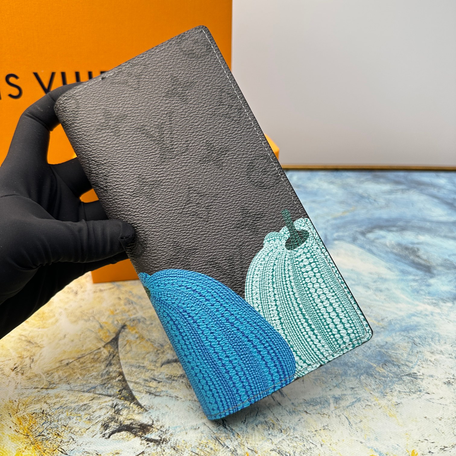 Close-up of the interior details of the leather bifold wallet.