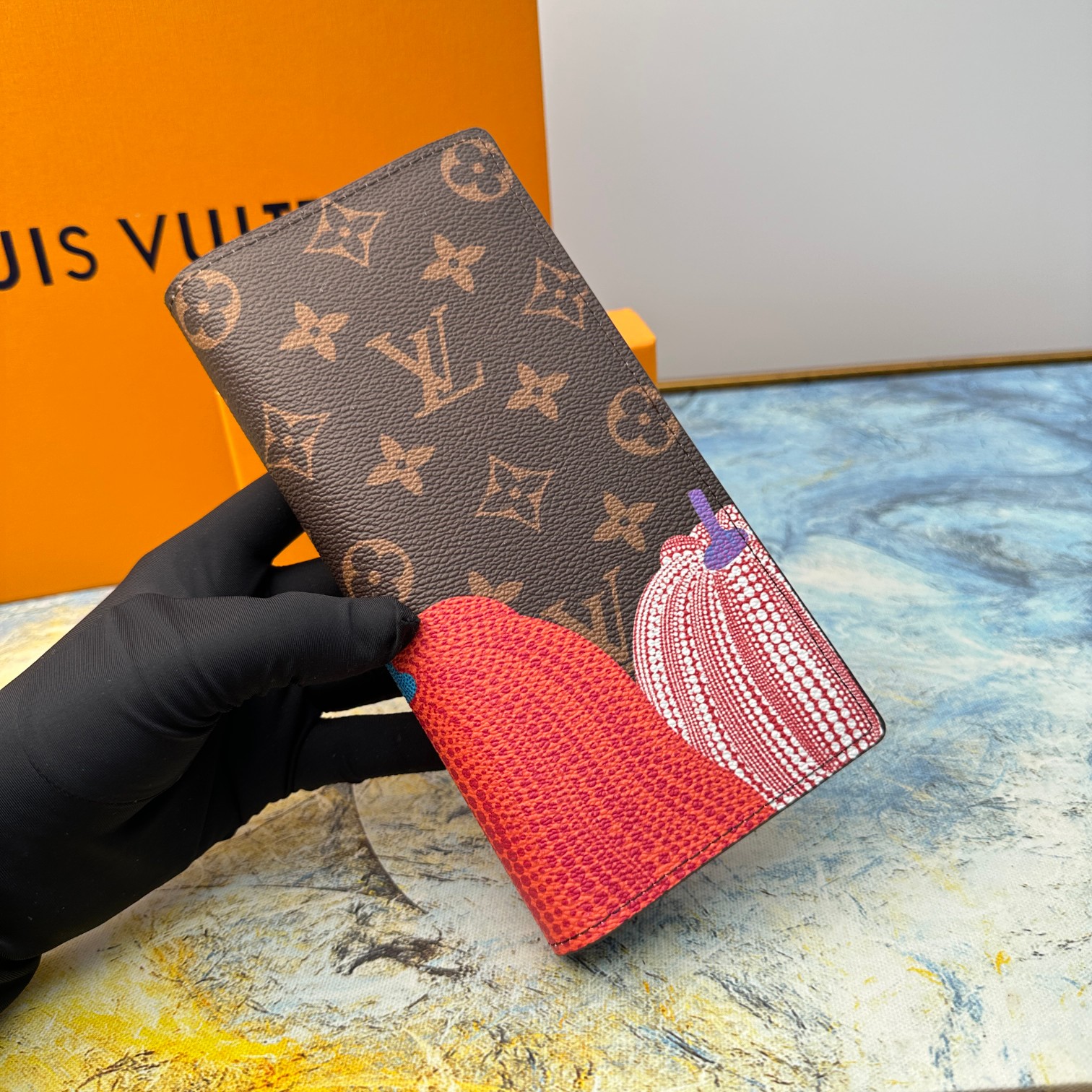 Detail shot of the stitching on the leather wallet.