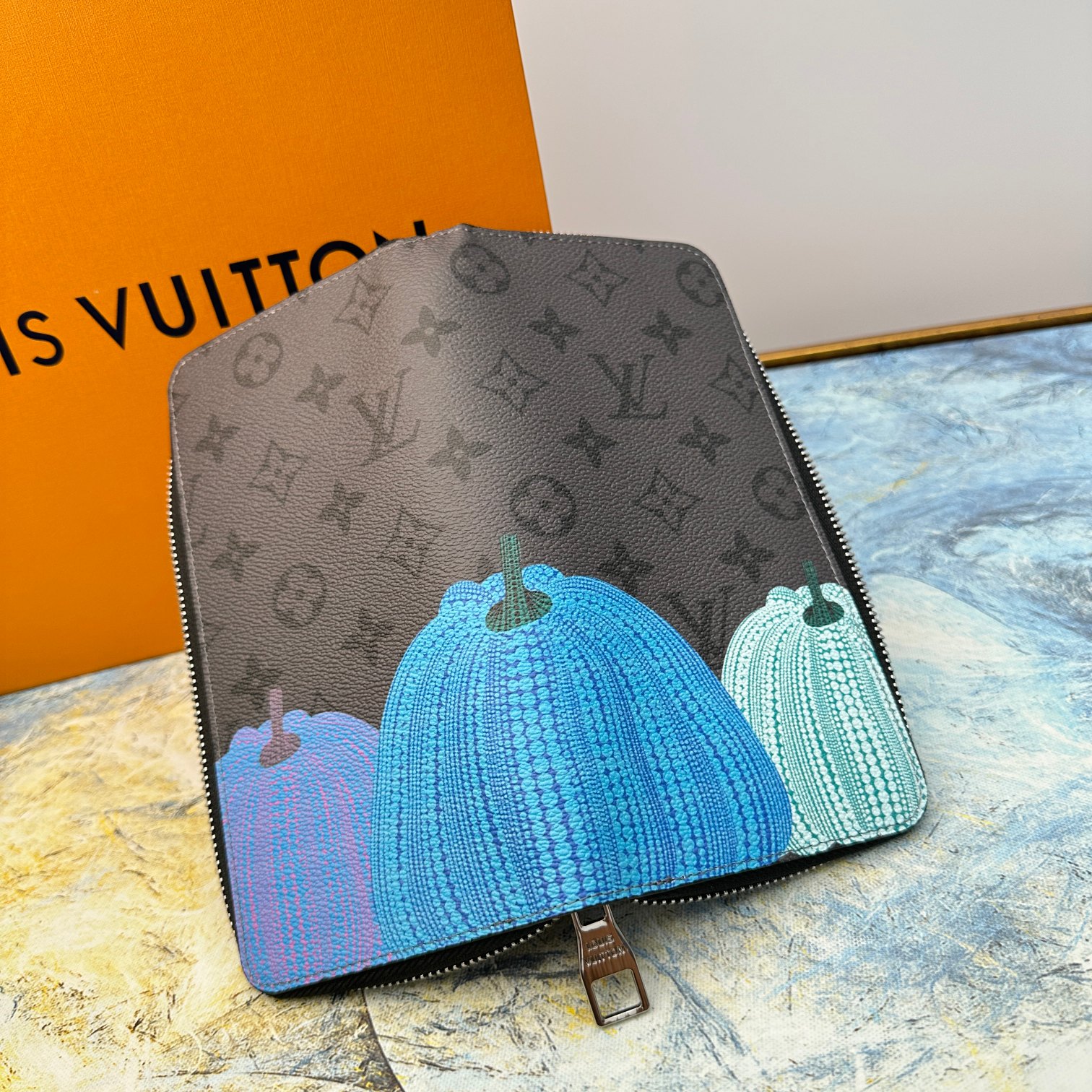 Leather zip around wallet in hand