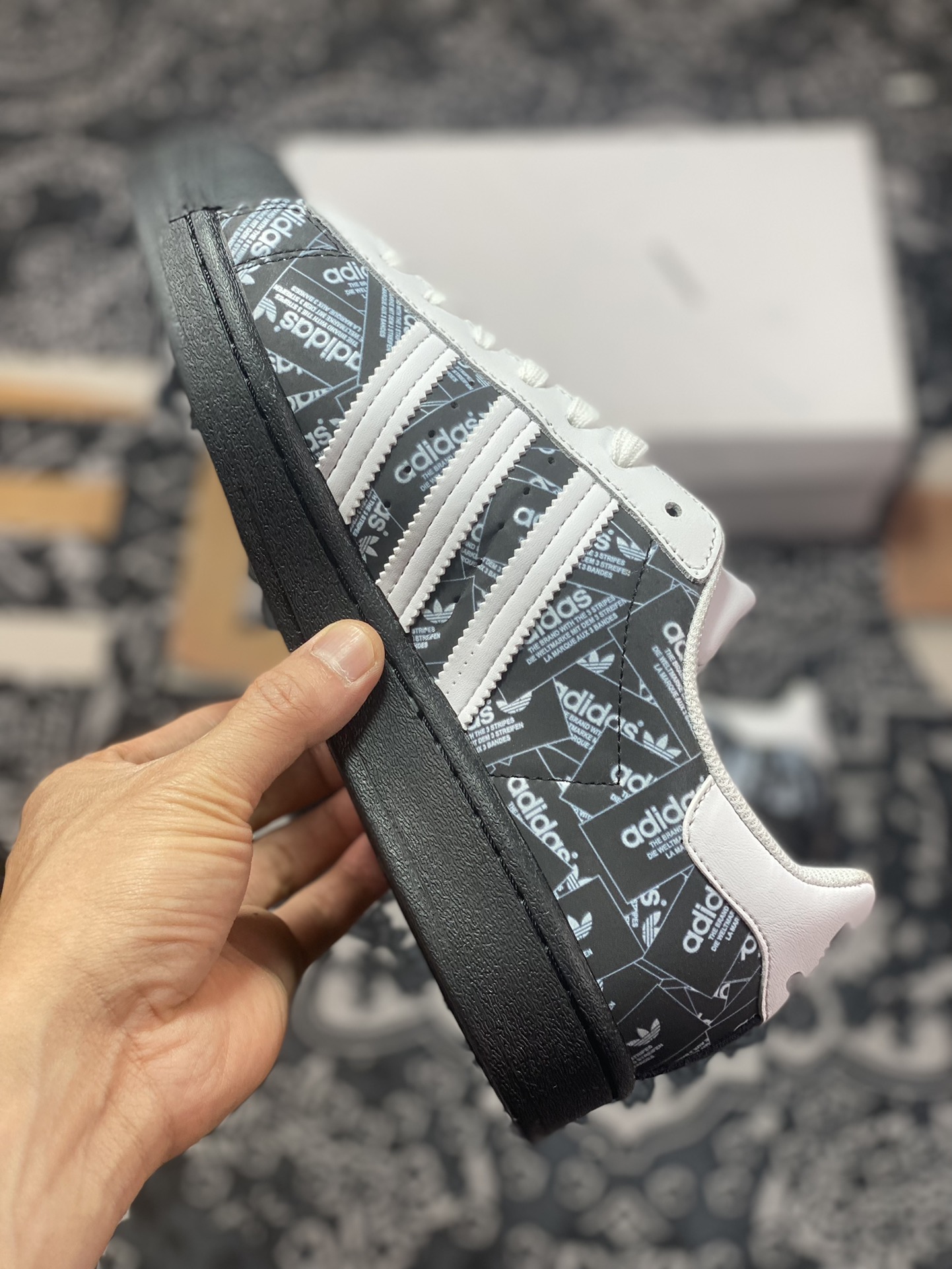 Originals Superstars All Over Print ”Reflective Labels” shell toe sneakers ”black and white gold text reflective brand label” FV2820