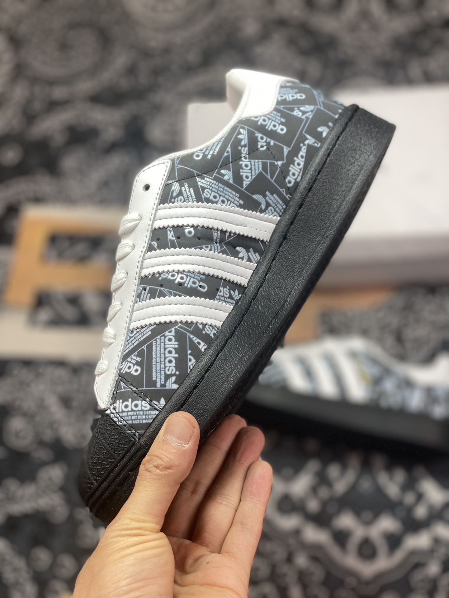 Originals Superstars All Over Print ”Reflective Labels” shell toe sneakers ”black and white gold text reflective brand label” FV2820