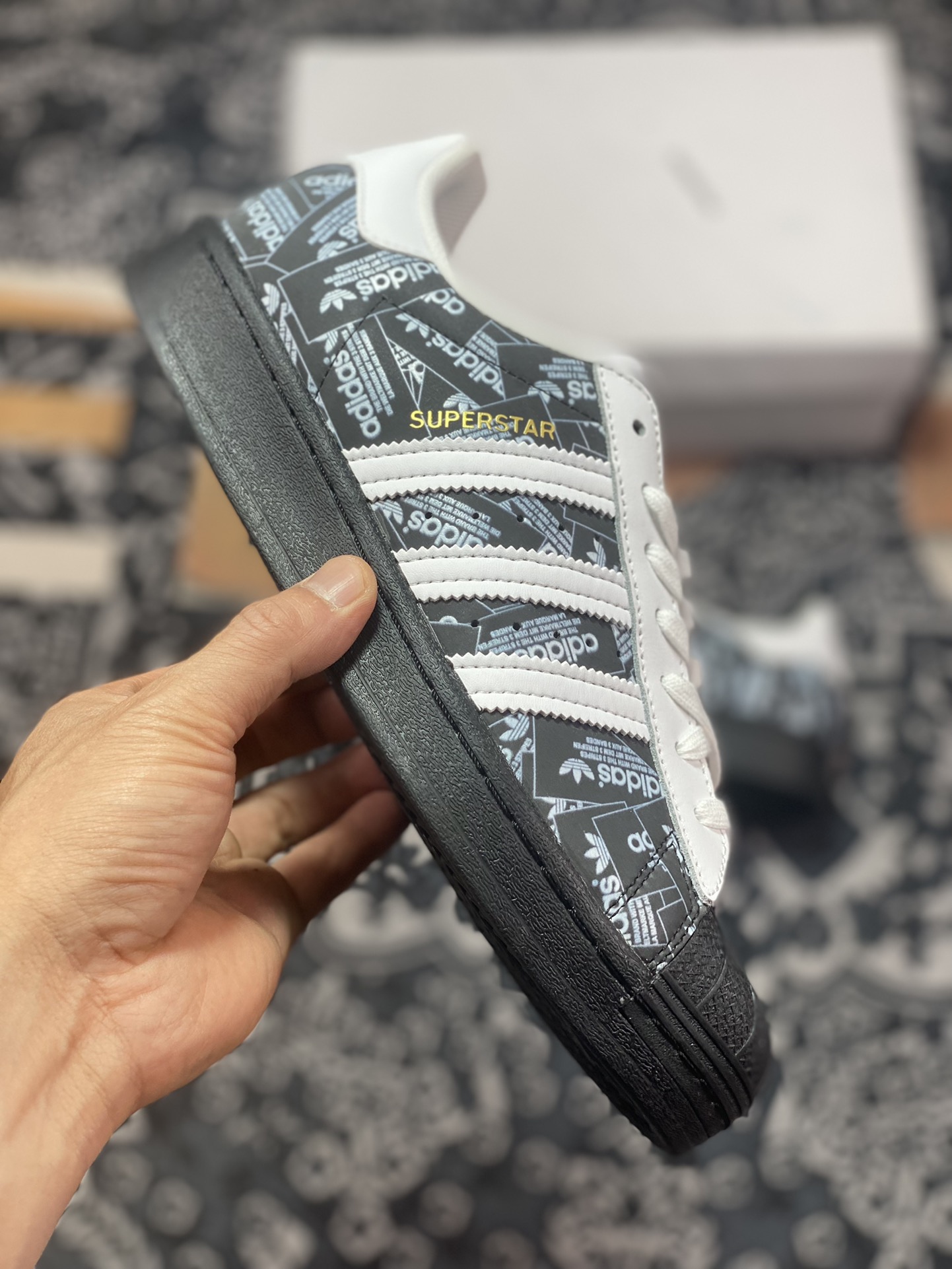 Originals Superstars All Over Print ”Reflective Labels” shell toe sneakers ”black and white gold text reflective brand label” FV2820