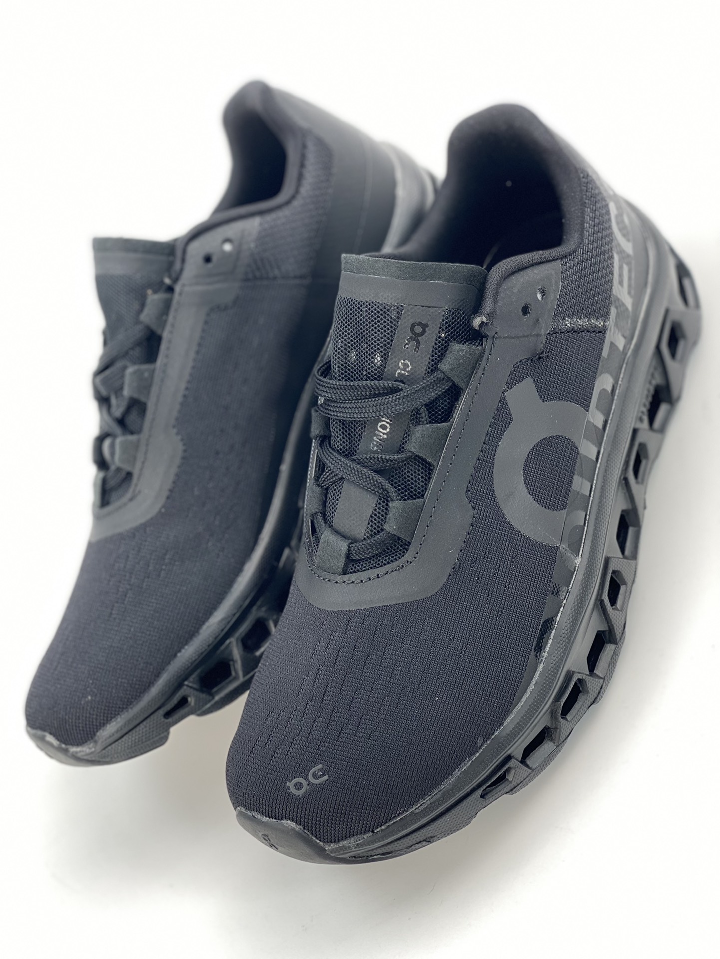 On Cloudmonster Glacier Black is a tennis-inspired sports casual shoe.