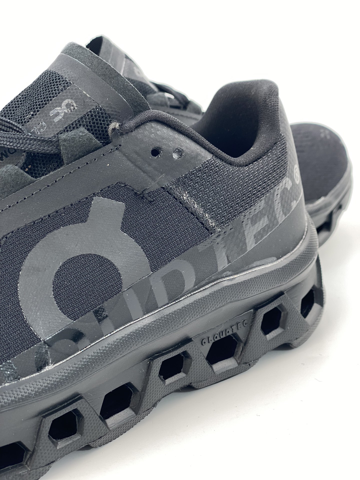 On Cloudmonster Glacier Black is a tennis-inspired sports casual shoe.