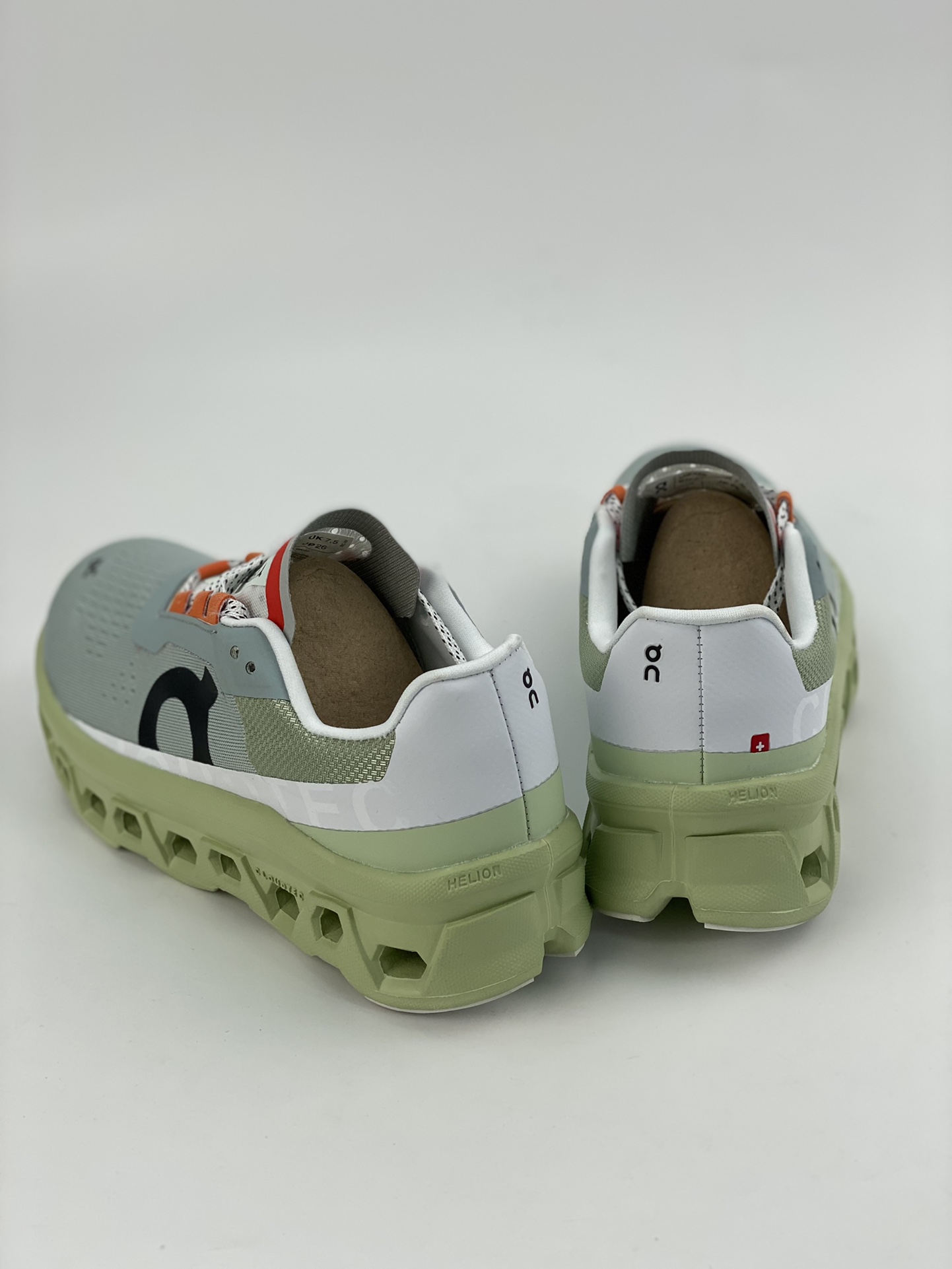 On Cloudmonster Glacier Grey Green is a tennis-inspired sports casual shoe.