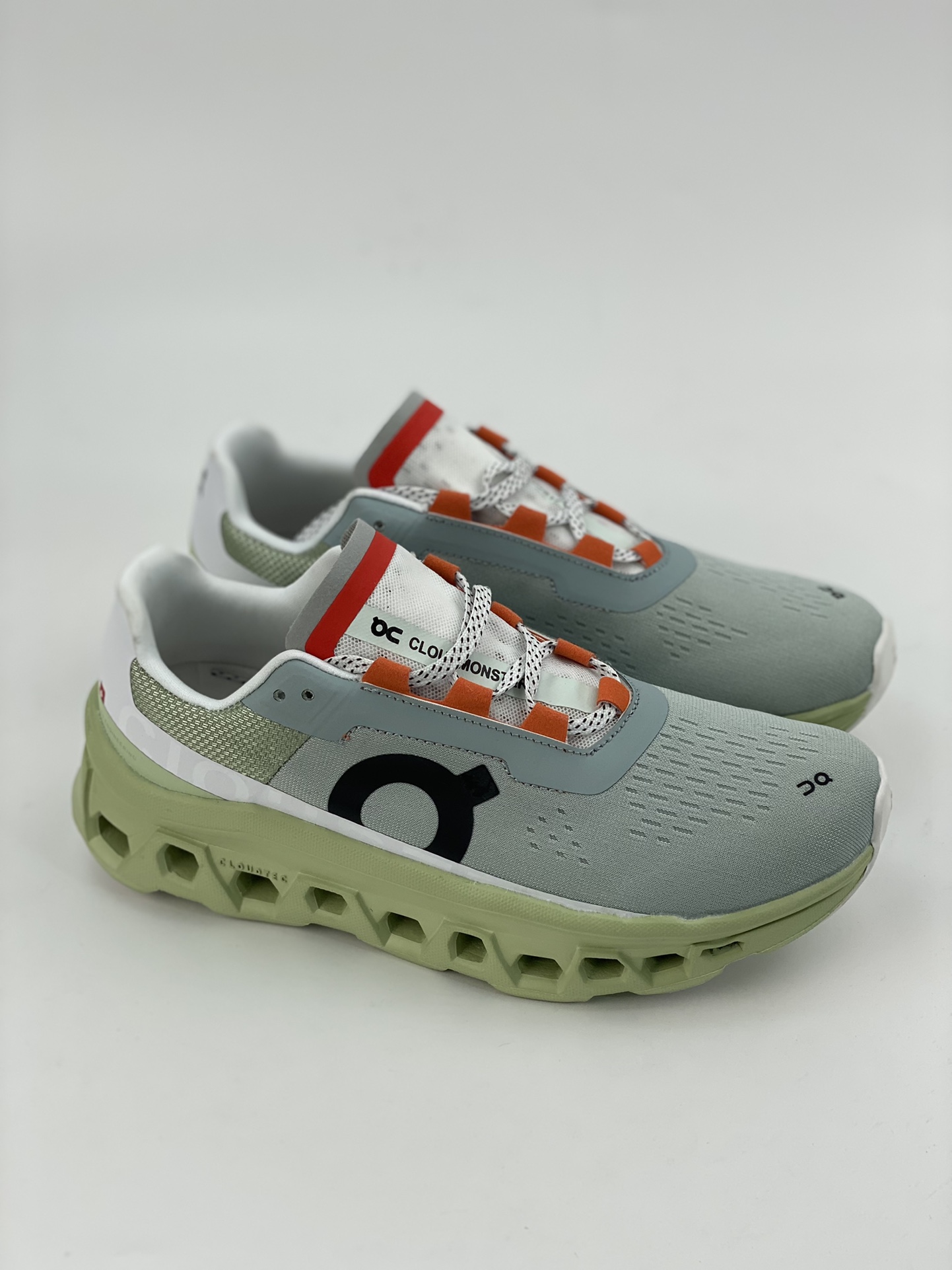 On Cloudmonster Glacier Grey Green is a tennis-inspired sports casual shoe.