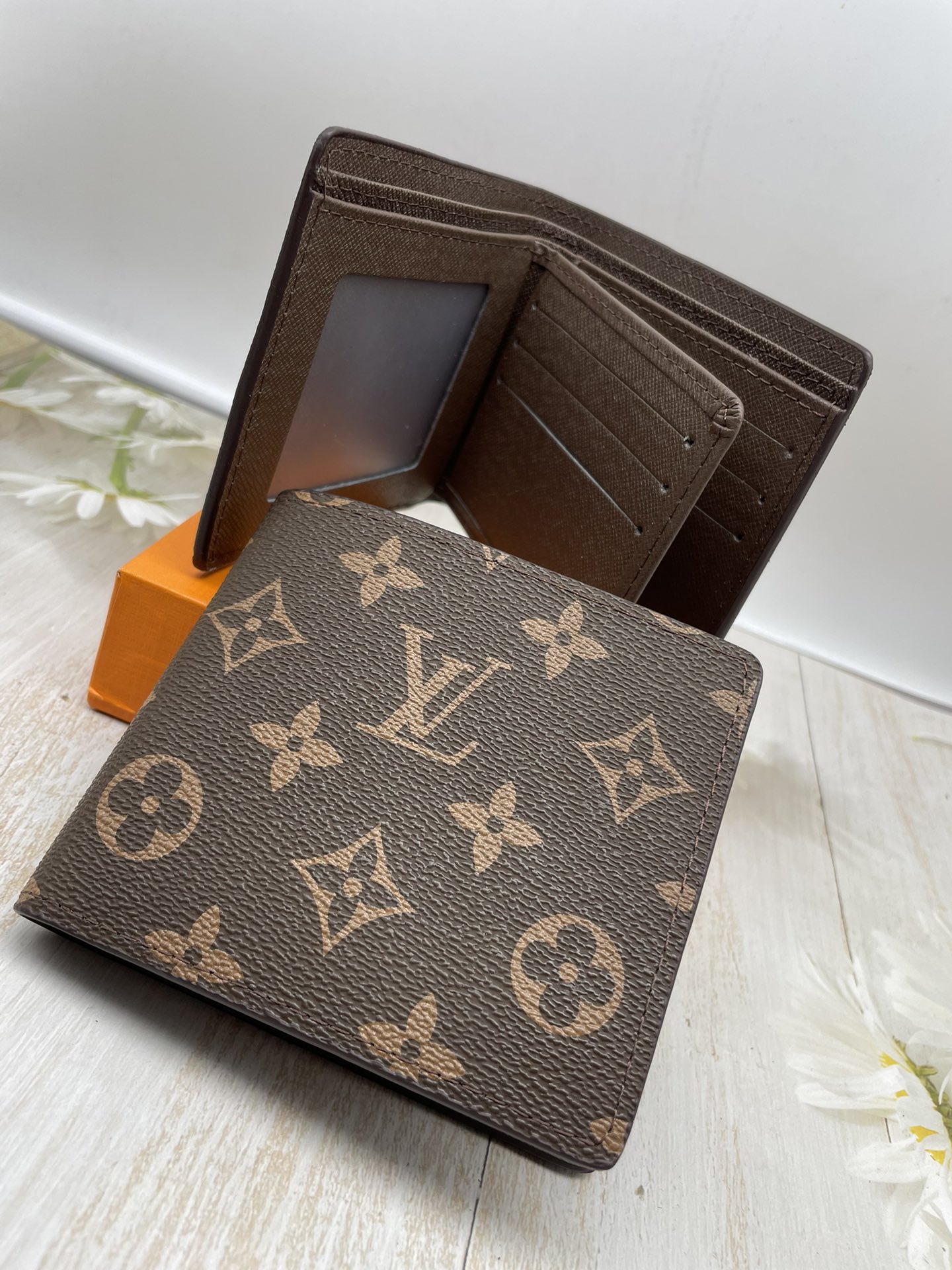 Bifold wallet interior with card and cash slots