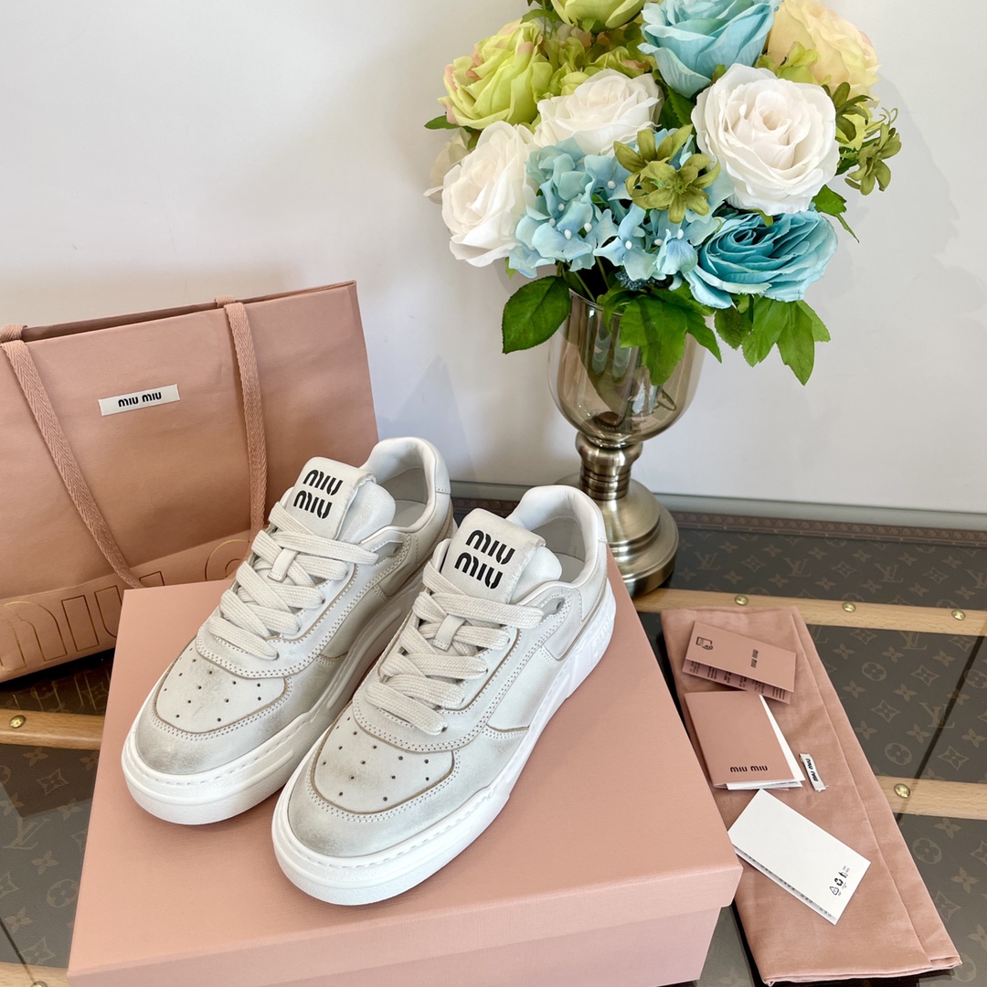 Miu Miu platform distressed leather sneakers