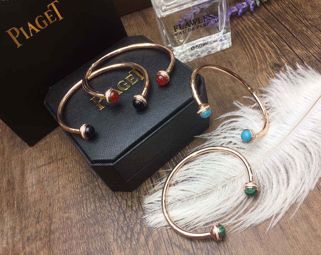 “Count Ossession’s Dynamic Rose Gold Bracelet with Colorful Jewels”