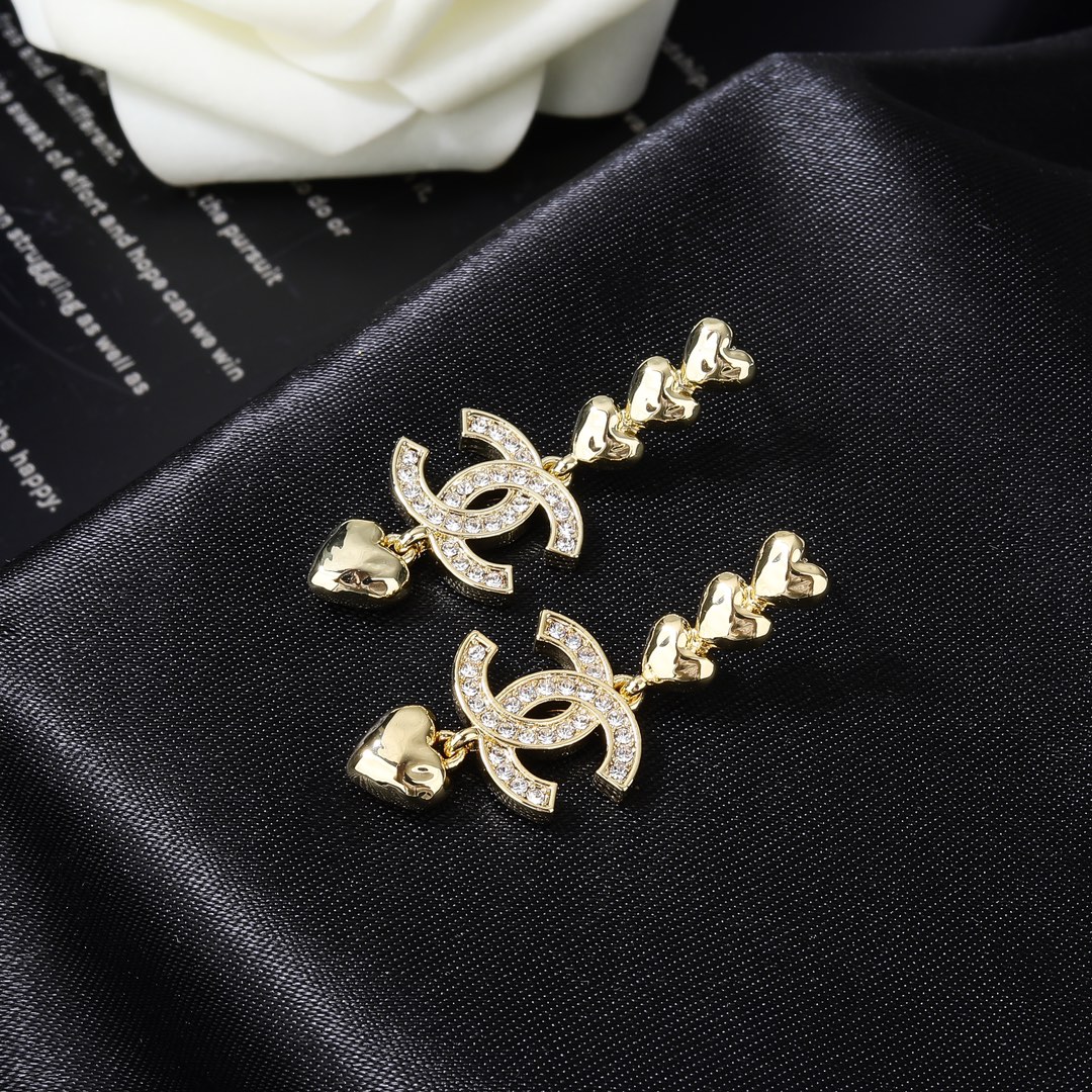 Chanel Dangle Earrings with CC Logo and Heart Charms 4 i1684464121 7033 2