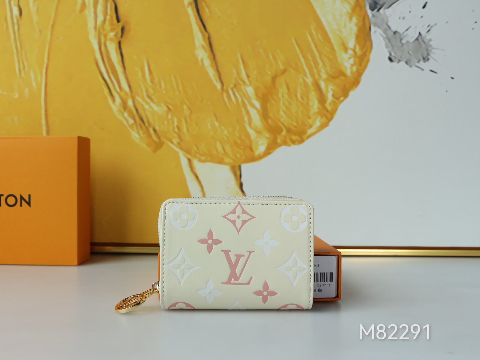 Portefeuille Roux card holder, front view, highlighting the quilted lambskin and Monogram pattern.
