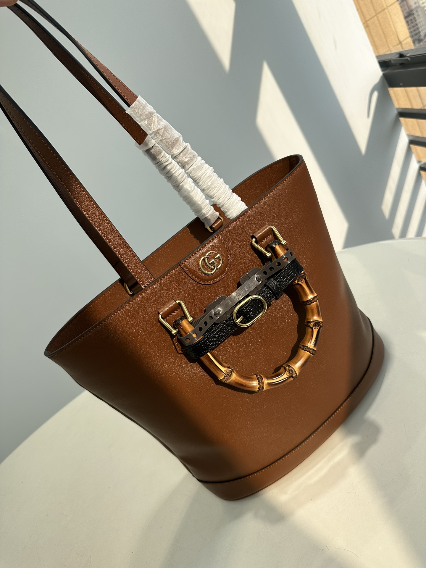 P1080 Pure originalCucci Gucci spring 23 Diana series bamboo shoulder bucket bag. Since its debut in 1991, Gucci's "Diana" handbag has always bee