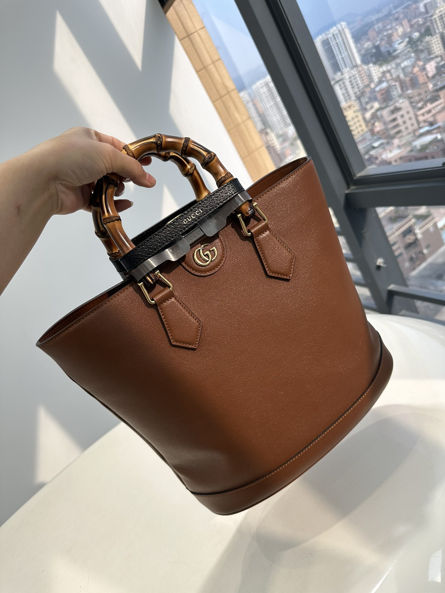 P1080 Pure originalCucci Gucci spring 23 Diana series bamboo shoulder bucket bag. Since its debut in 1991, Gucci's "Diana" handbag has always bee