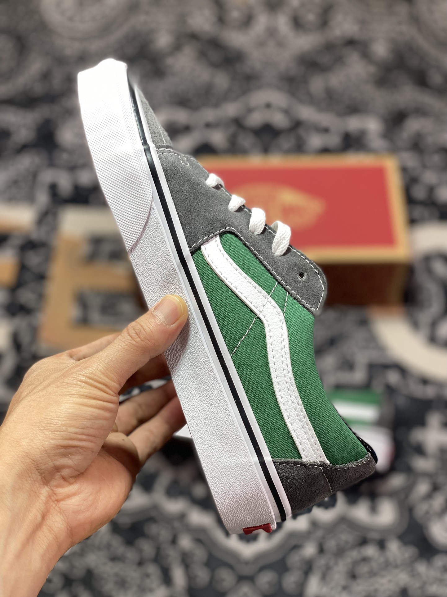 Defining a simple and versatile style, I highly recommend Vans SK8-Low in contrasting gray and green.