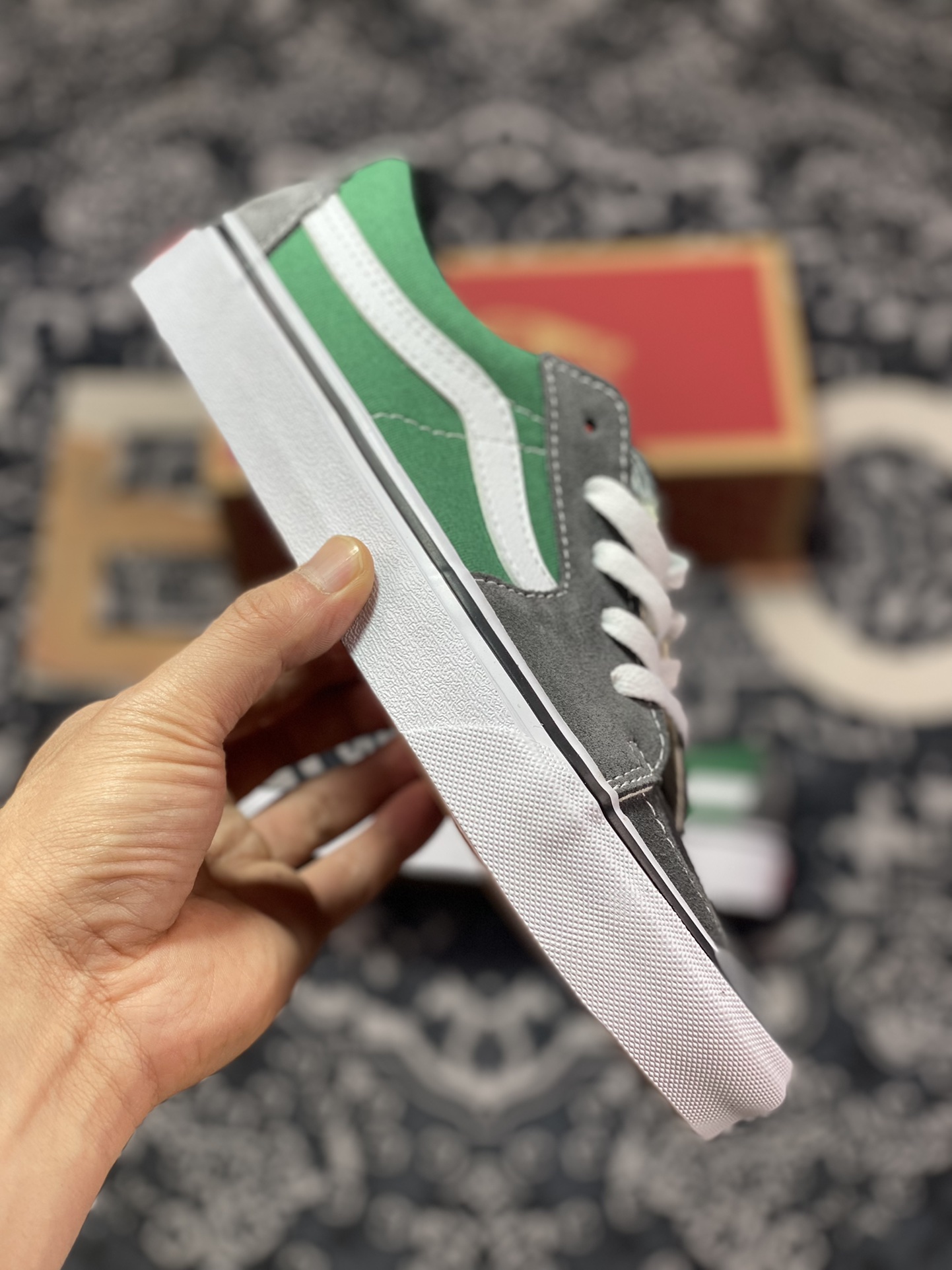 Defining a simple and versatile style, I highly recommend Vans SK8-Low in contrasting gray and green.