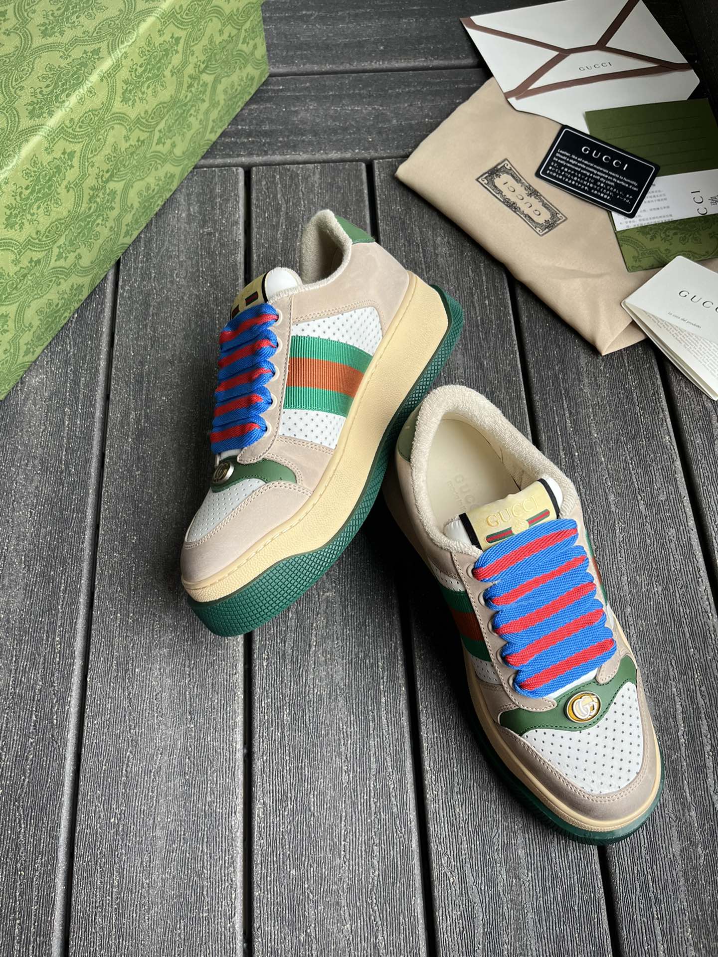 Кроссовки Gucci на высокой подошве с красно-синими шнурками
