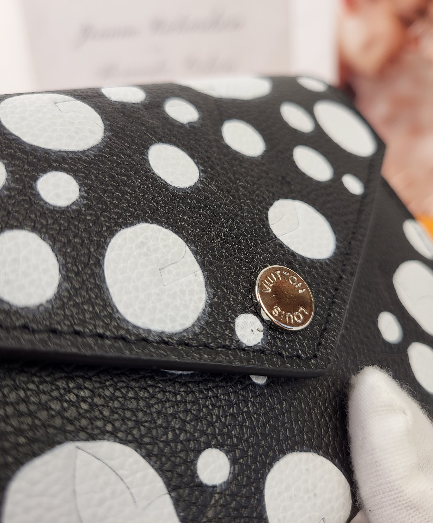 Louis Vuitton x Yayoi Kusama Zippy wallet in hand