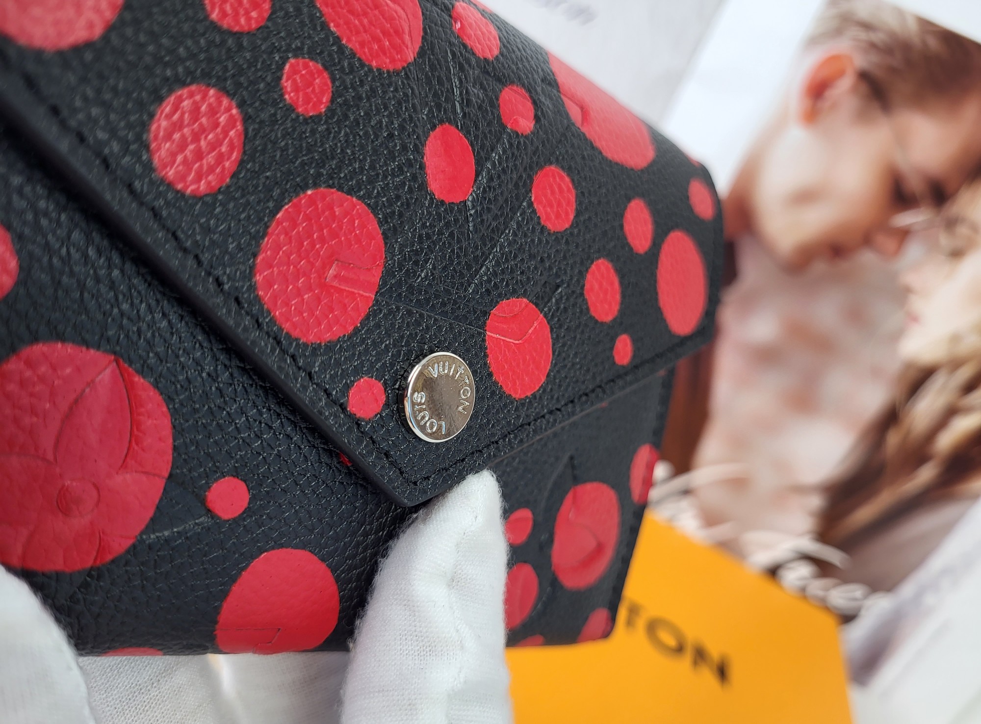 Louis Vuitton x Yayoi Kusama Zippy wallet in hand