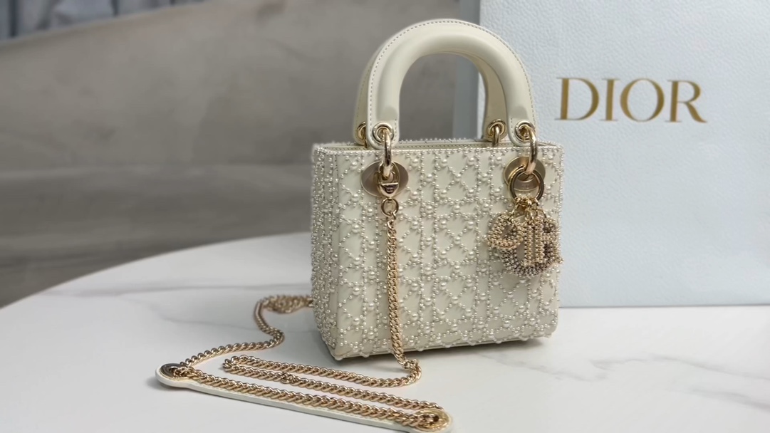 Dior Lady Di, or three-frame embroidery with half a pearl