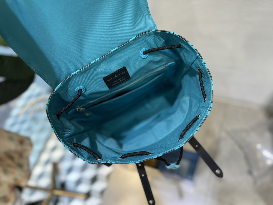 M21936 M41379 Christopher PM Backpack in Monogram canvas evokes the - Bag 8