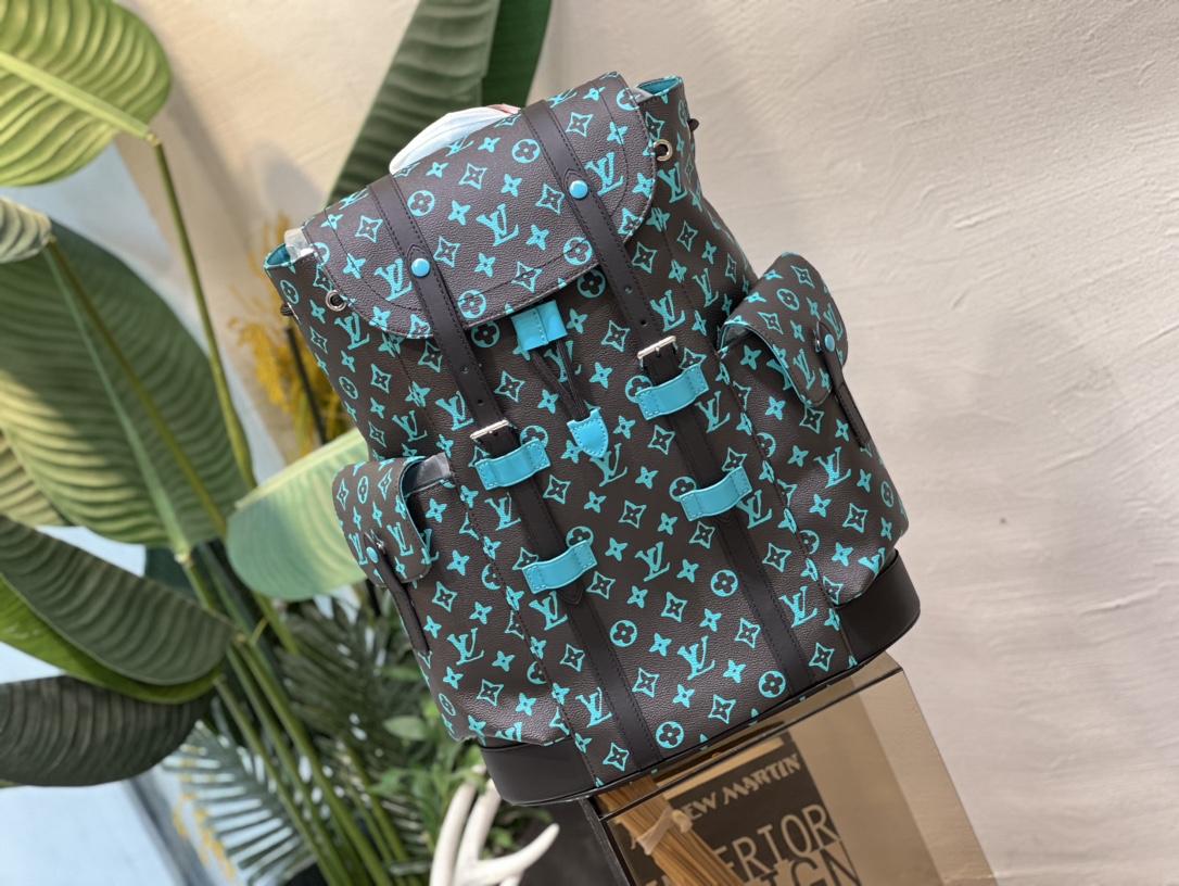 M21936 M41379 Christopher PM Backpack in Monogram canvas evokes the - Bag 2