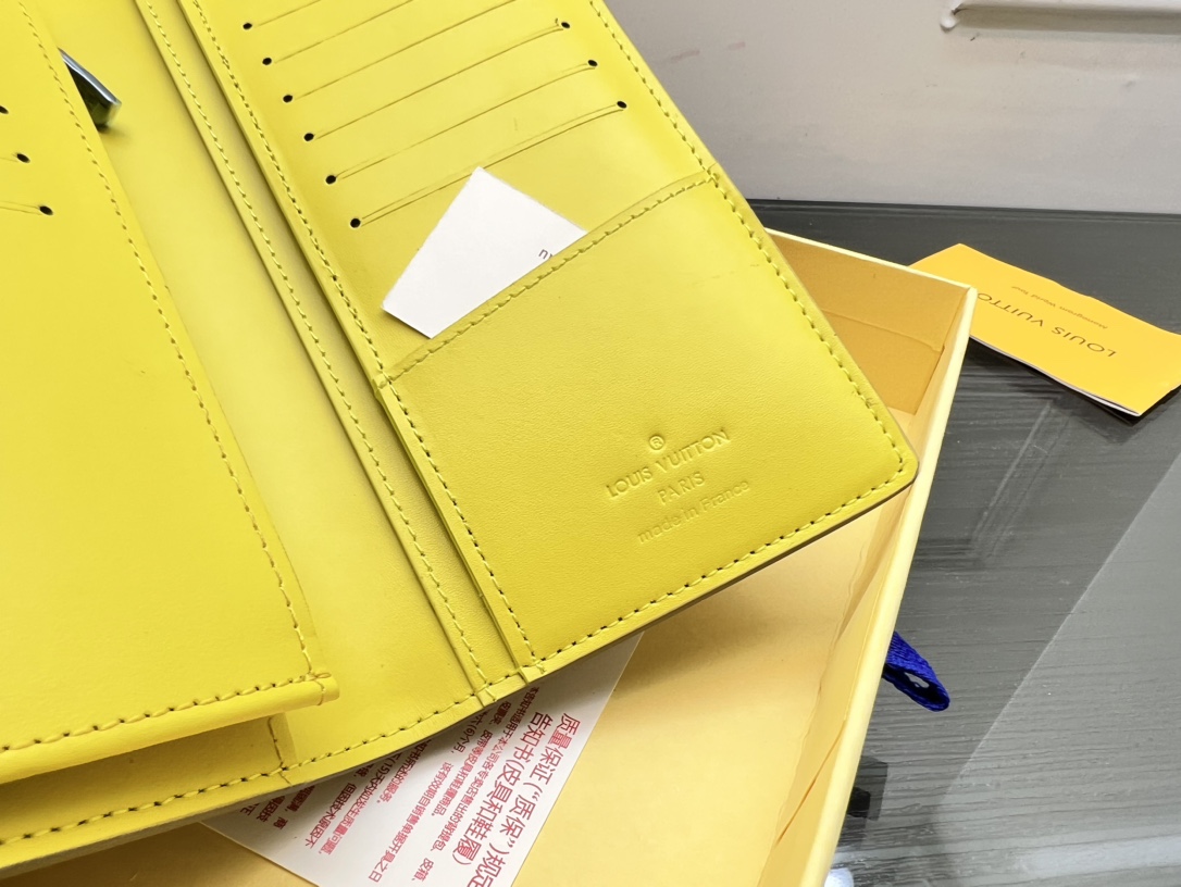 Close-up detail of the stitching on a leather bifold wallet