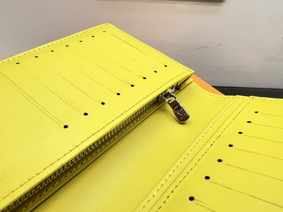 Inside card slots of leather bifold wallet