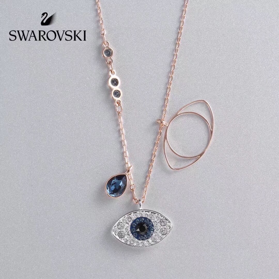 Swarovski 经典款 恶魔之眼锁骨项链 这款链坠可为装扮增添神秘魅力。两枚分别密镶蓝色、黑色和透明