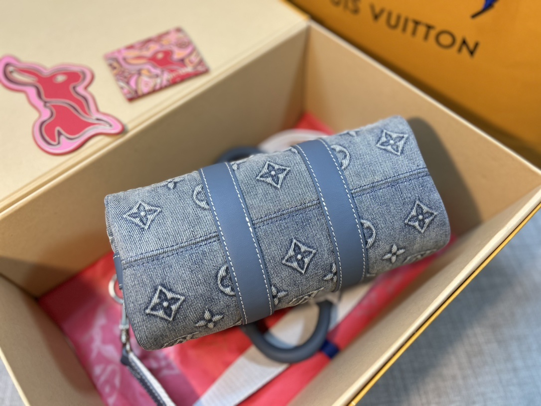 顶级原单M22762本款KeepallBandoulière25手袋展现MonogramWashedDe