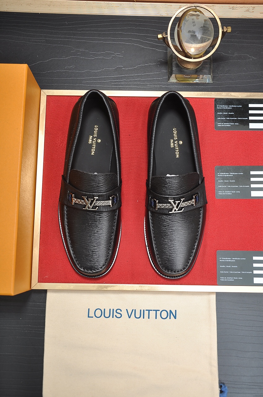 Louis Vuitton Koeienhuid Echt leer Rubber