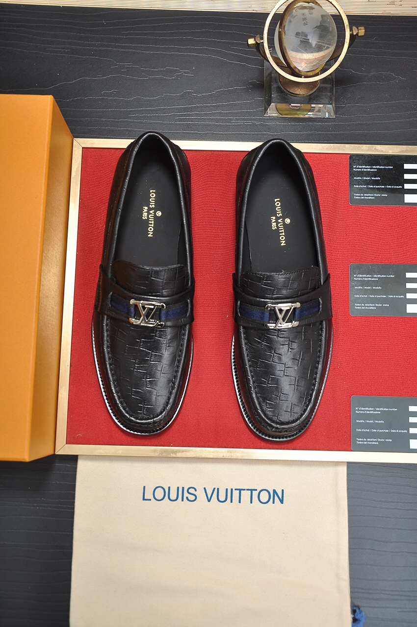 Louis Vuitton Koeienhuid Echt leer Rubber