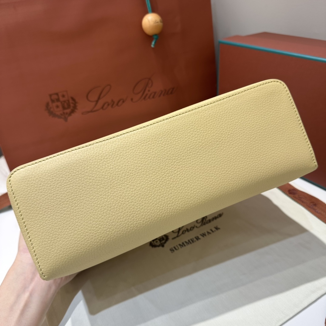L27黄油色ExtrapocketL27系列手提/斜挎包不被定义的生活才最自在就像loropiana的材