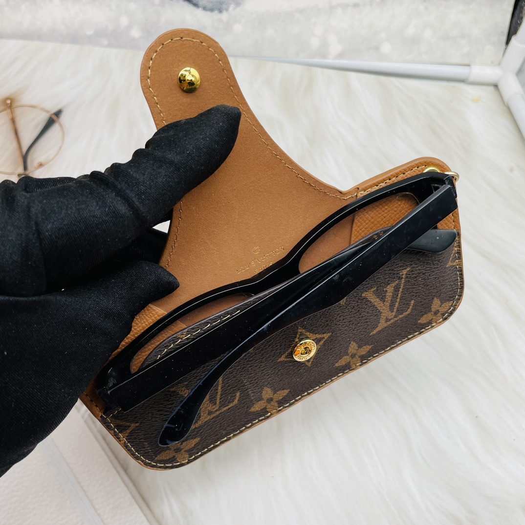Leather glasses case, open