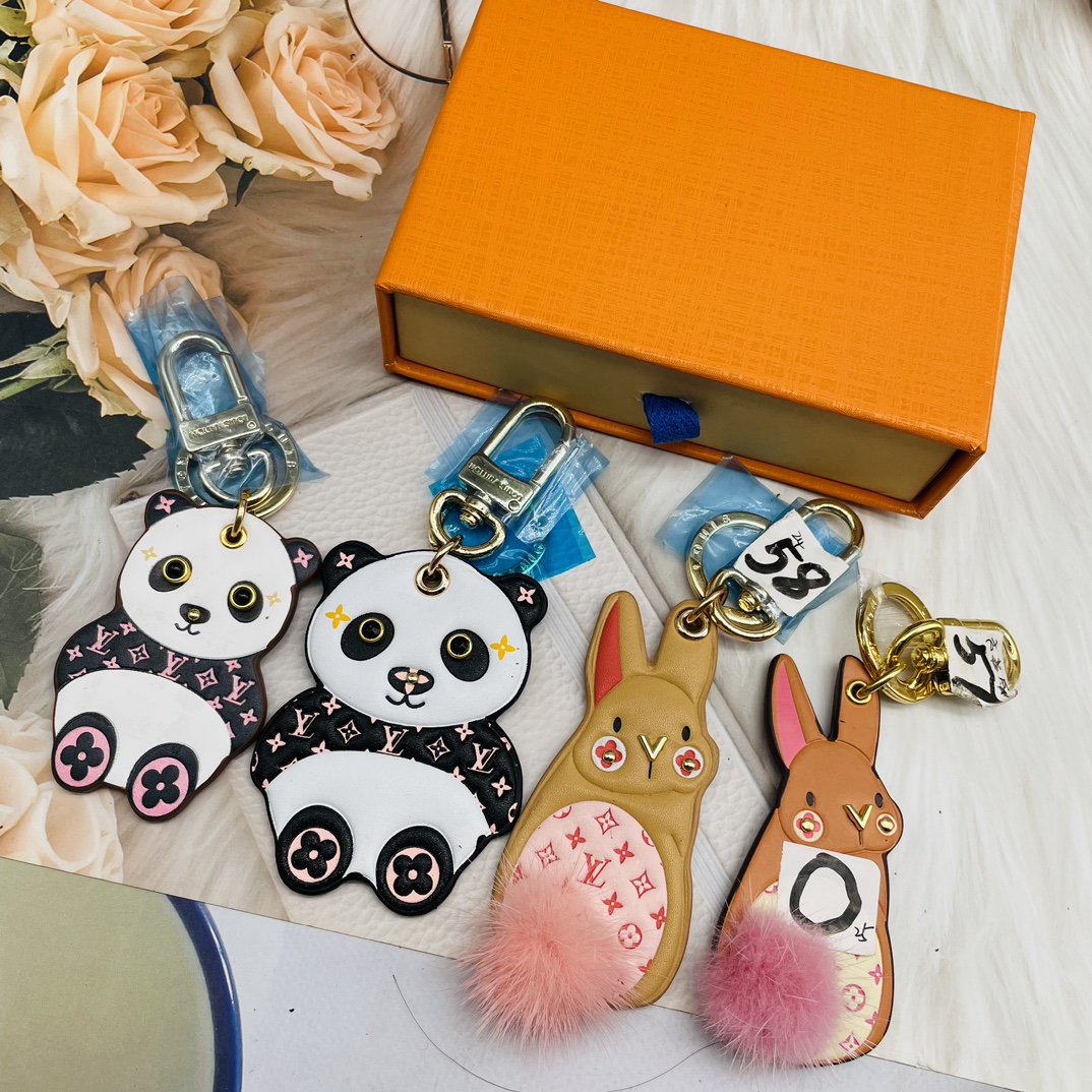 Bear and cat keychain on backpack