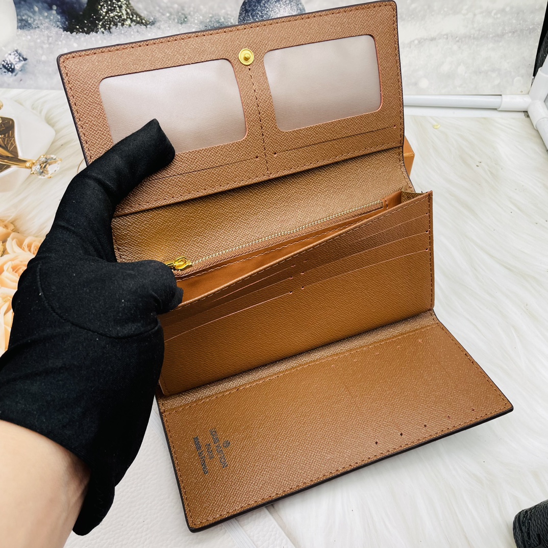 Leather Long Wallet - Carrying Essentials Leather long wallet carrying essentials