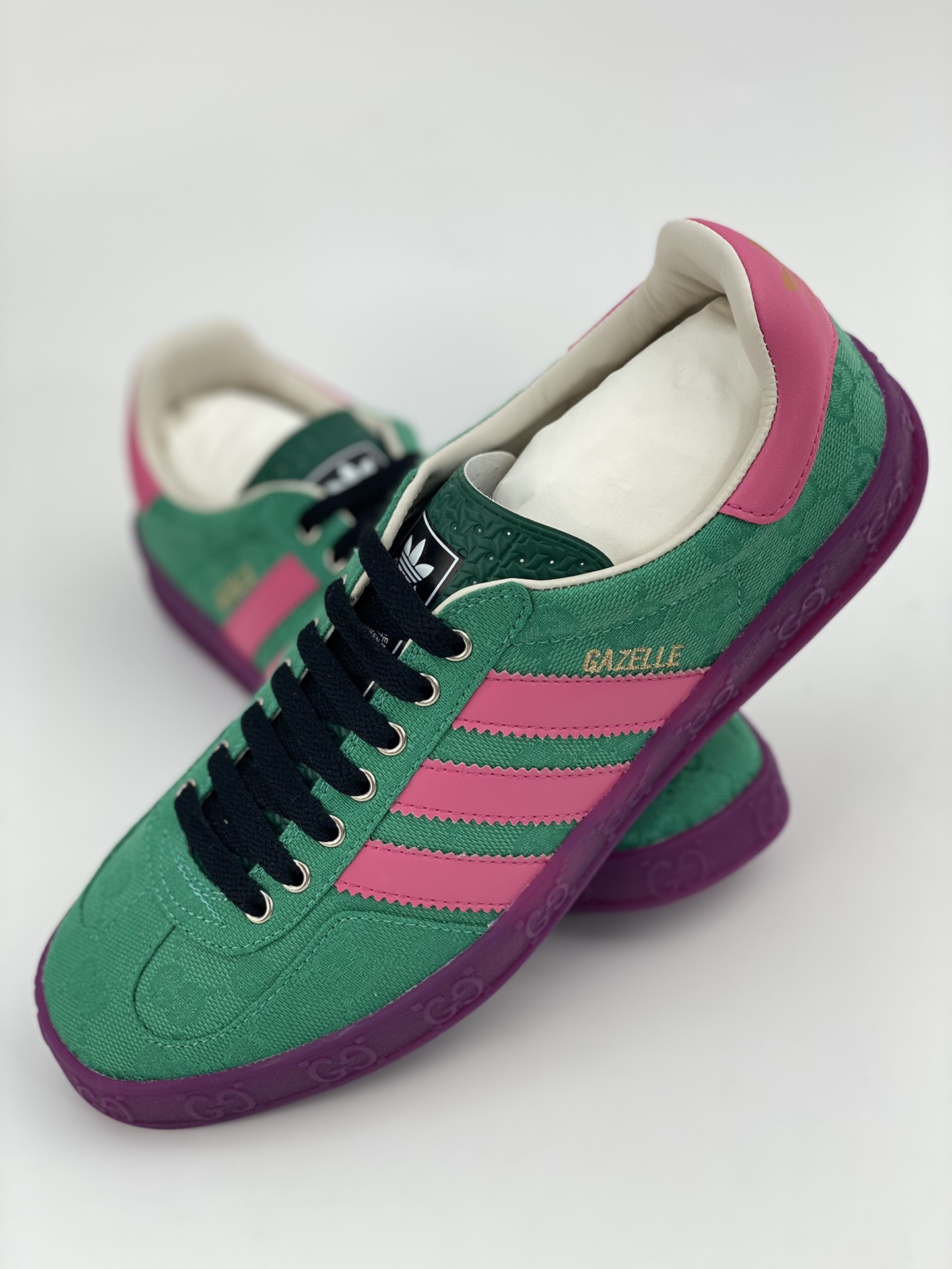 Adidas x GUCCI's blockbuster co-branded clover logo and iconic three bars are design elements