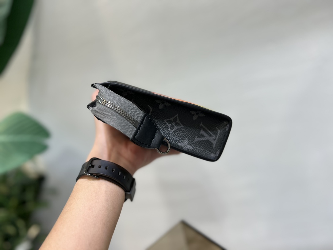 The Alpha Wearable Wallet combines Monogram Eclipse canvas with leather - Bag 3