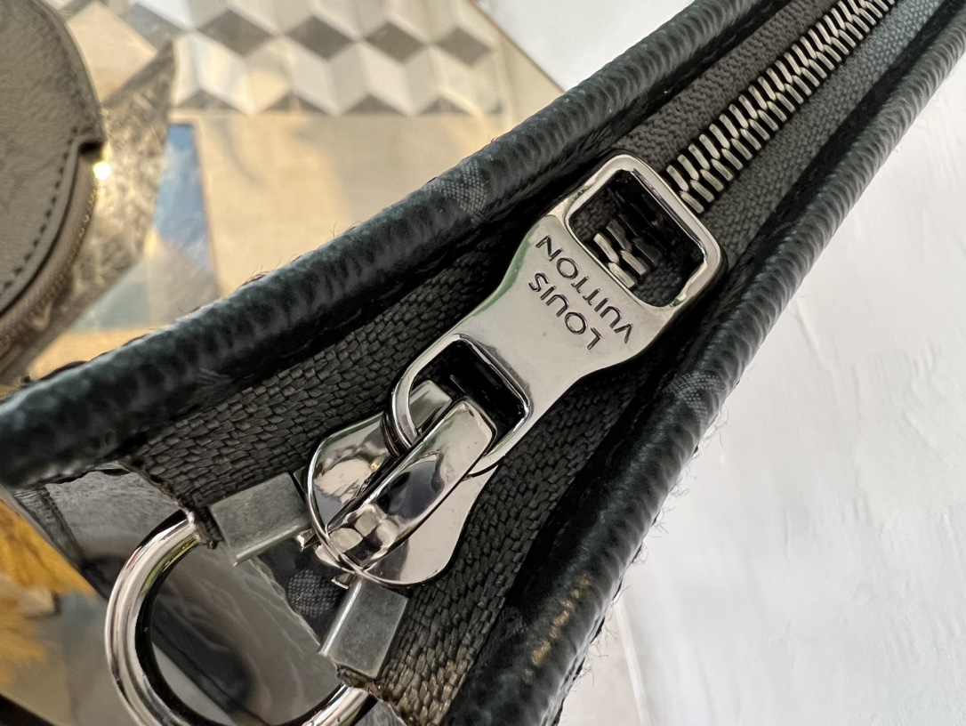 The Alpha Wearable Wallet combines Monogram Eclipse canvas with leather - Bag 6