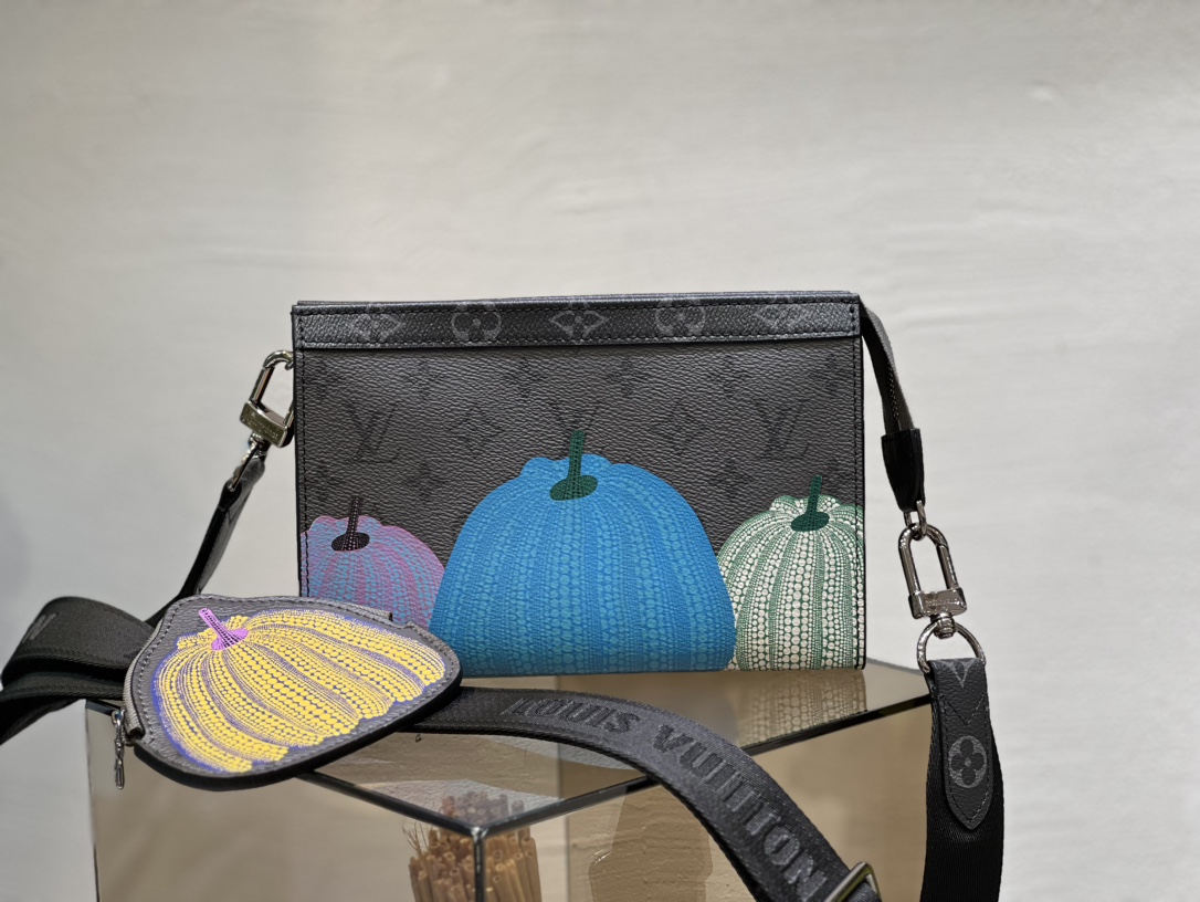 The Alpha Wearable Wallet combines Monogram Eclipse canvas with leather - Bag