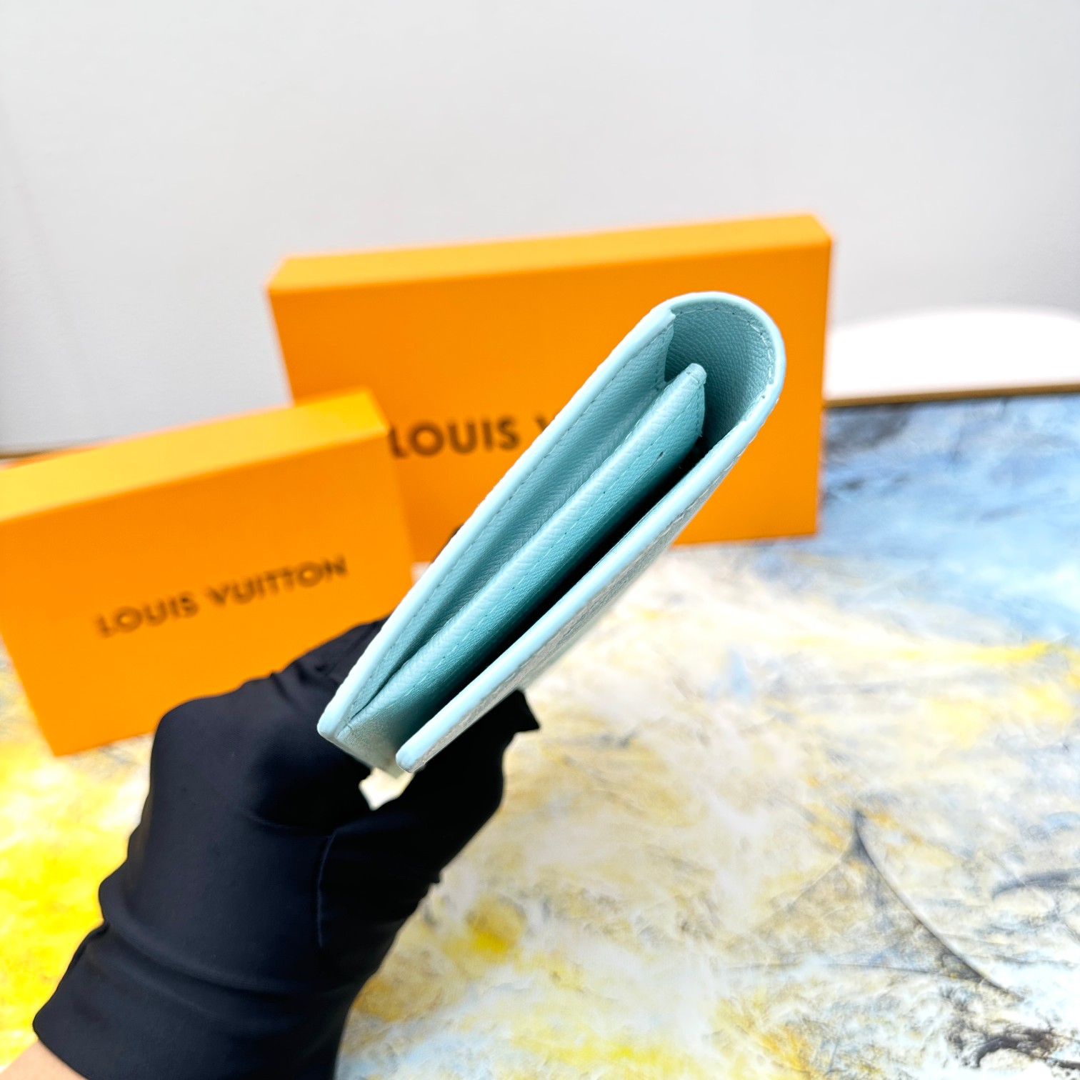 Leather bifold wallet in a gift box